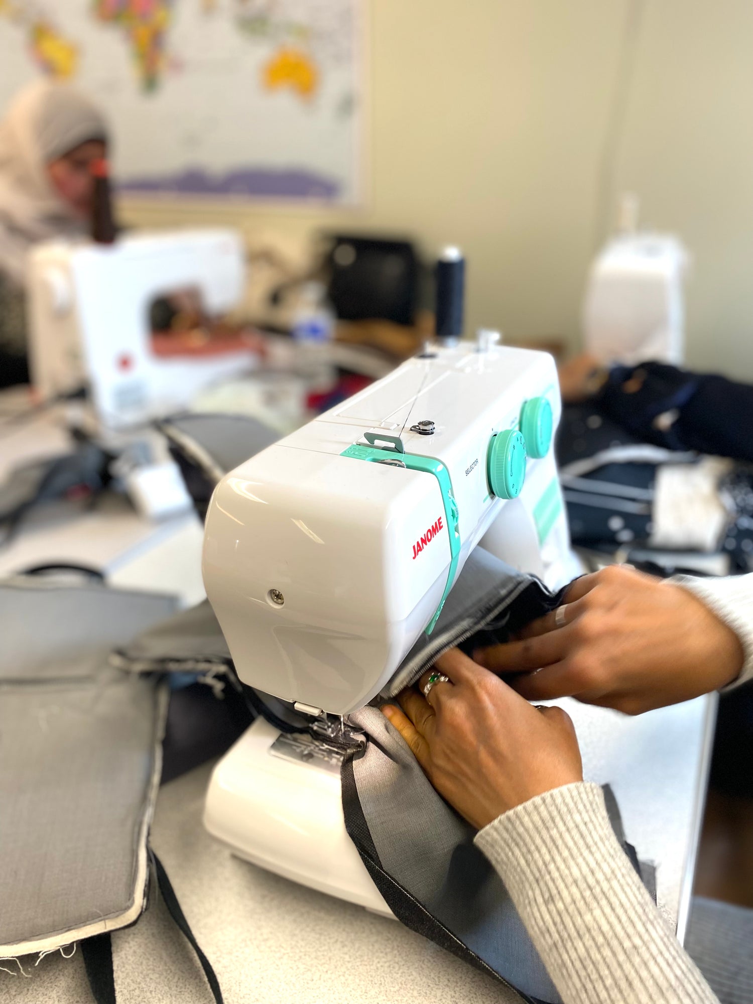 Janome 2200xt sewing machine being used for sewing a back pack in a sewing class