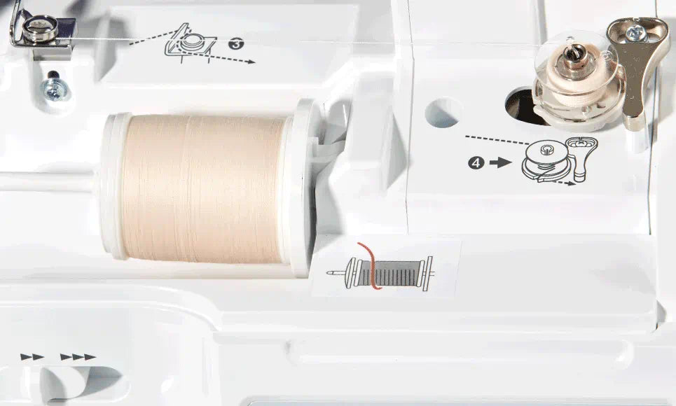 Brother Innov-is F420's bobbin winding system with a spool of beige thread and detailed instructional guide icons for user assistance.