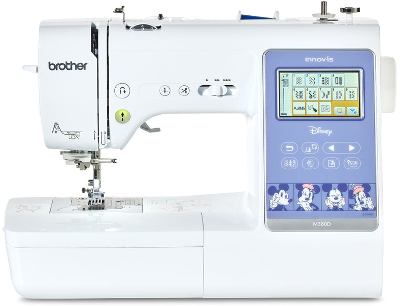 Brother Innov-is M380D: Close-up of embroidery and sewing machine set up for general sewing and quilting. Features iconic Disnet characters under display and controls