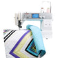 Janome Memory Craft 6700P demonstrating the spacious workspace between the needle and machine body, with a partially sewn quilt highlighting the machine's capacity for large projects.